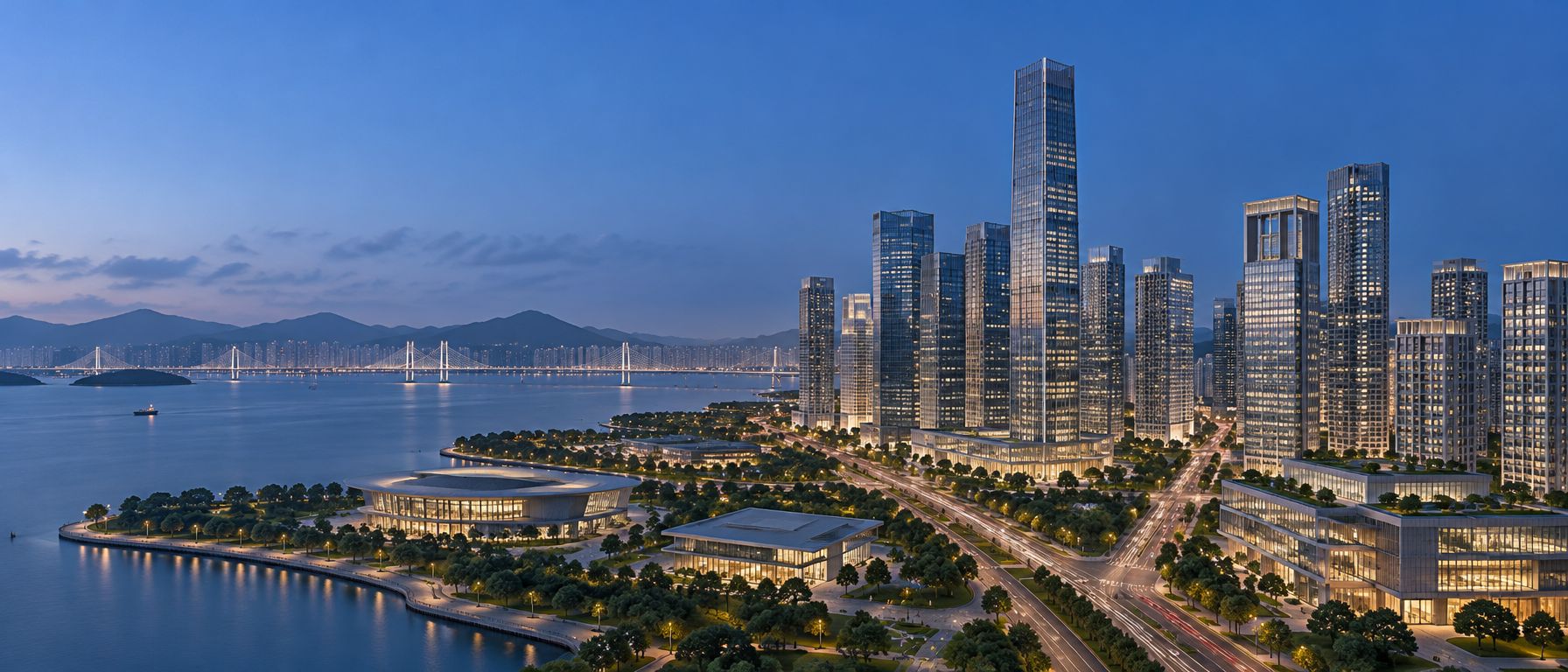 A waterfront city district at blue hour, with towers, a bridge and lit tree-lined streets